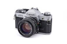 Appareil photo argentique Canon AE-1 + 50mm f1.4 FDn Noir gris Reconditionné